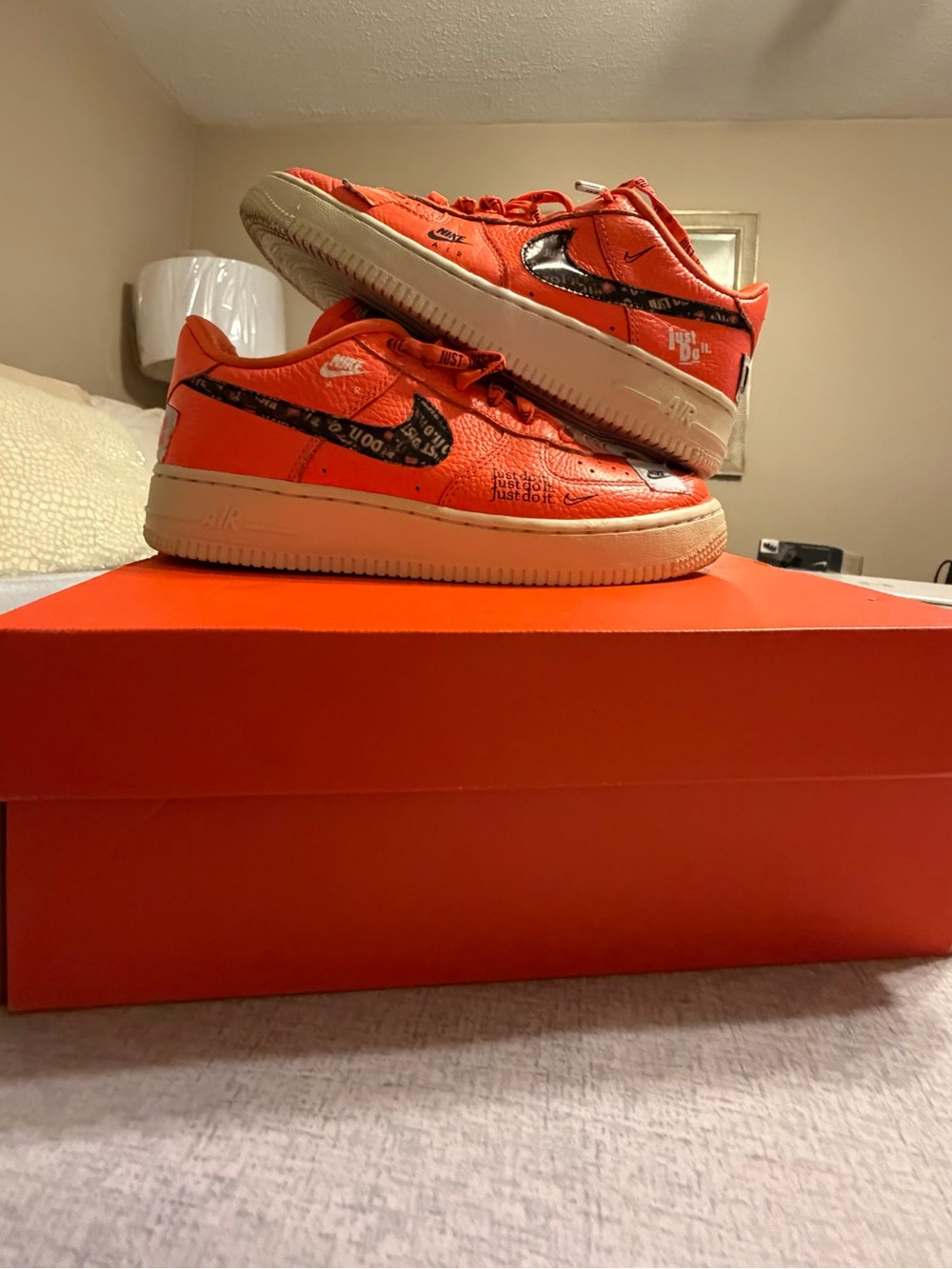 Nike Orange and Black Graphic Swoosh Low-Top Sneakers